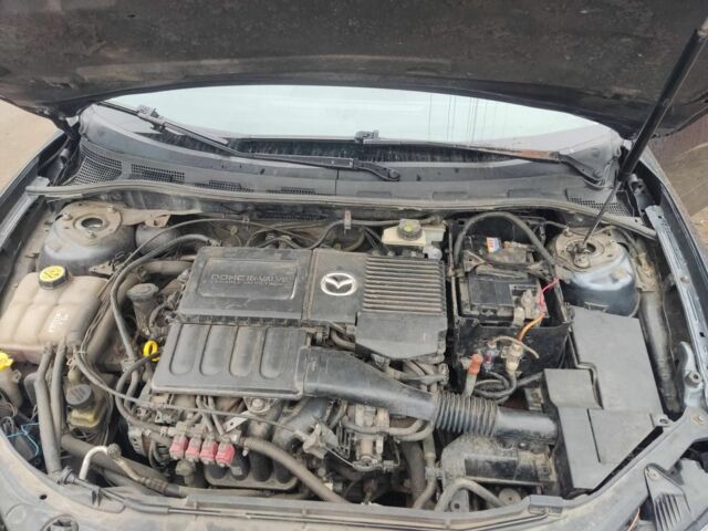 Сірий Мазда 3, об'ємом двигуна 1.6 л та пробігом 235 тис. км за 4000 $, фото 1 на Automoto.ua