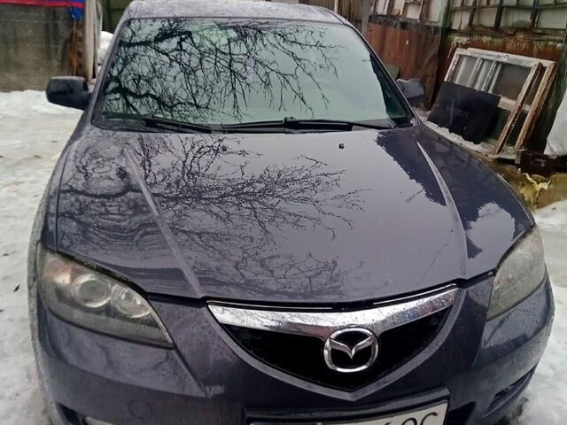 Серый Мазда 3, объемом двигателя 1.6 л и пробегом 1470 тыс. км за 5000 $, фото 1 на Automoto.ua