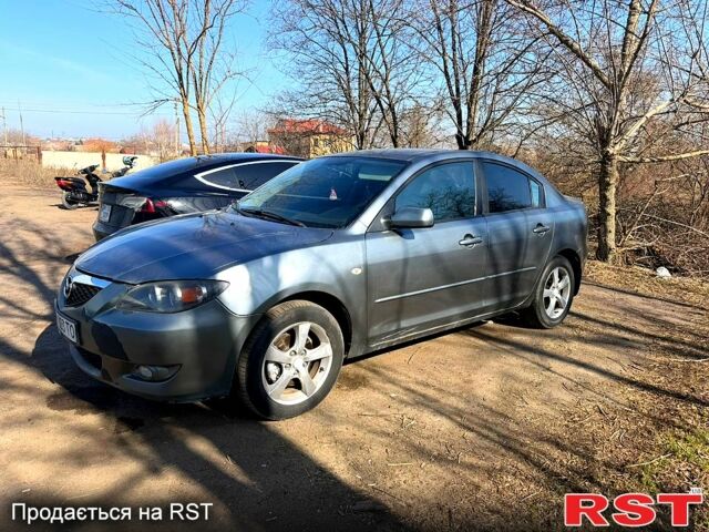 Серый Мазда 3, объемом двигателя 1.6 л и пробегом 222 тыс. км за 5500 $, фото 1 на Automoto.ua