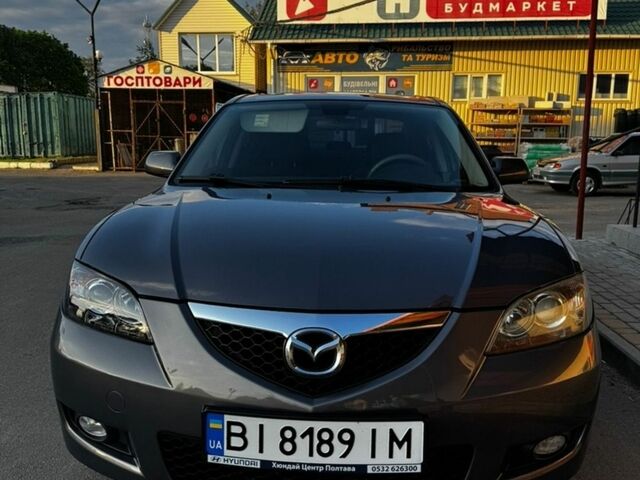 Серый Мазда 3, объемом двигателя 1.6 л и пробегом 258 тыс. км за 5300 $, фото 1 на Automoto.ua