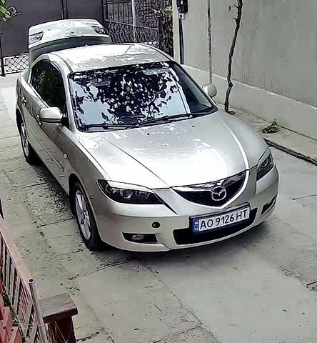 Серый Мазда 3, объемом двигателя 2 л и пробегом 227 тыс. км за 5200 $, фото 1 на Automoto.ua