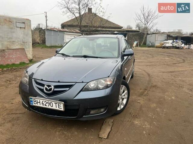 Серый Мазда 3, объемом двигателя 1.6 л и пробегом 221 тыс. км за 5600 $, фото 1 на Automoto.ua