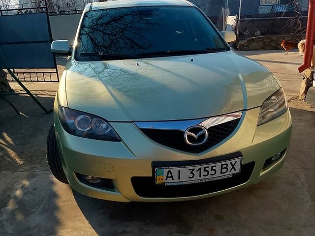 Серый Мазда 3, объемом двигателя 1.6 л и пробегом 202 тыс. км за 4400 $, фото 1 на Automoto.ua