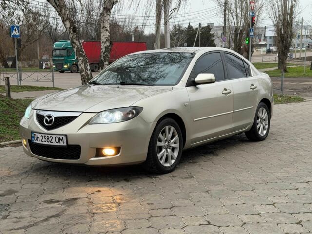 Серый Мазда 3, объемом двигателя 1.6 л и пробегом 170 тыс. км за 6000 $, фото 1 на Automoto.ua