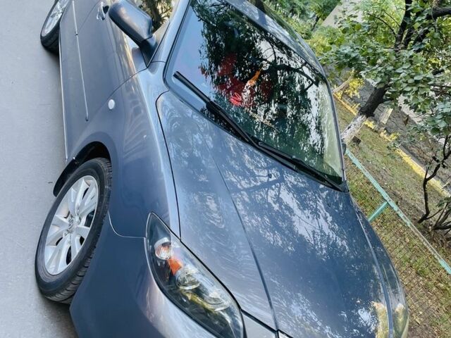Серый Мазда 3, объемом двигателя 1.6 л и пробегом 204 тыс. км за 5500 $, фото 1 на Automoto.ua