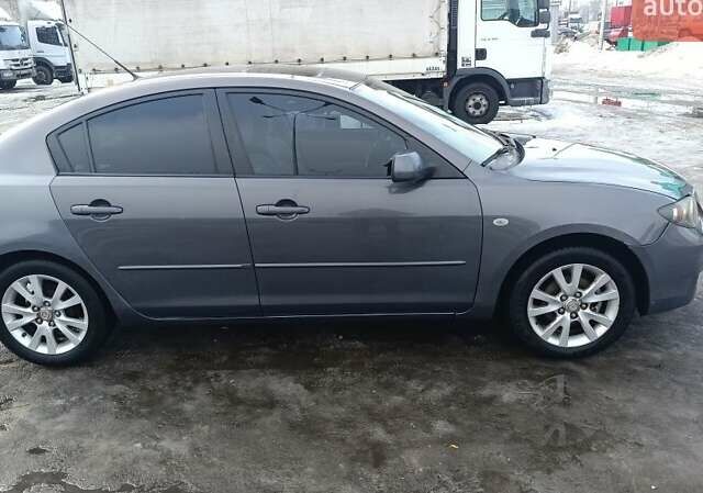 Серый Мазда 3, объемом двигателя 1.6 л и пробегом 245 тыс. км за 4288 $, фото 1 на Automoto.ua