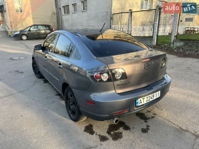 Серый Мазда 3, объемом двигателя 2 л и пробегом 290 тыс. км за 4999 $, фото 1 на Automoto.ua