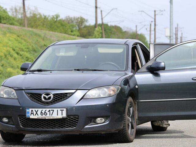 Серый Мазда 3, объемом двигателя 1.6 л и пробегом 224 тыс. км за 5500 $, фото 1 на Automoto.ua