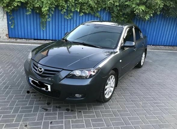 Серый Мазда 3, объемом двигателя 1.6 л и пробегом 226 тыс. км за 2999 $, фото 1 на Automoto.ua