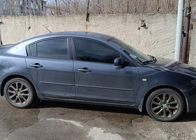 Серый Мазда 3, объемом двигателя 1.6 л и пробегом 274 тыс. км за 4200 $, фото 1 на Automoto.ua