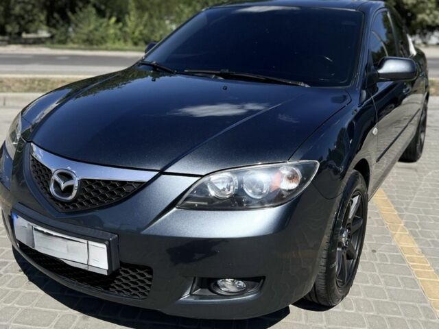 Серый Мазда 3, объемом двигателя 1.6 л и пробегом 140 тыс. км за 777 $, фото 1 на Automoto.ua