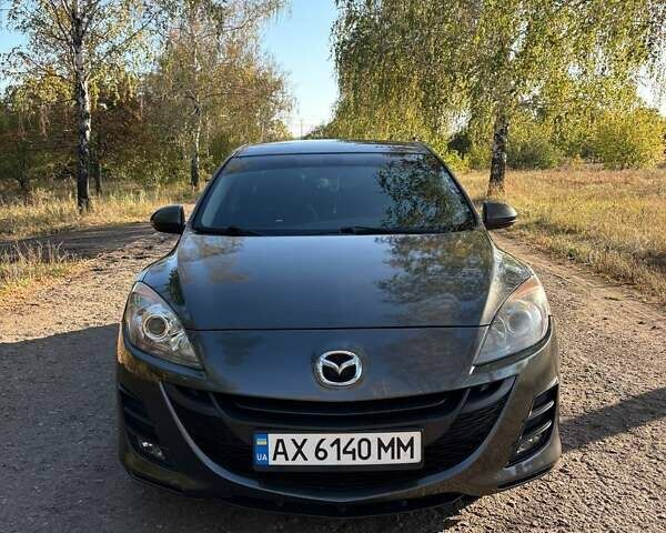 Серый Мазда 3, объемом двигателя 1.56 л и пробегом 193 тыс. км за 6700 $, фото 1 на Automoto.ua