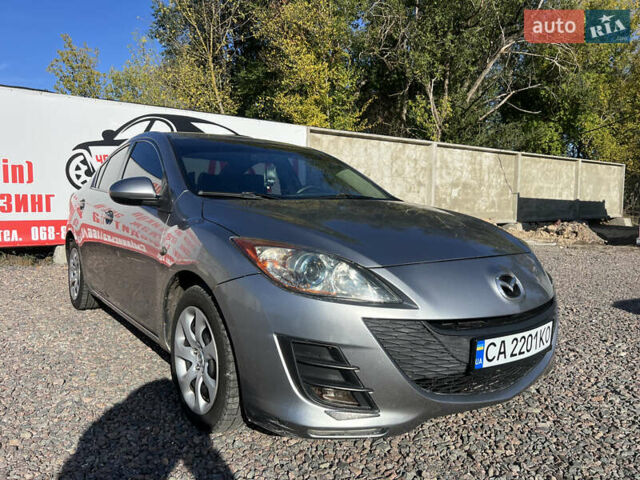Сірий Мазда 3, об'ємом двигуна 2 л та пробігом 145 тис. км за 6200 $, фото 1 на Automoto.ua