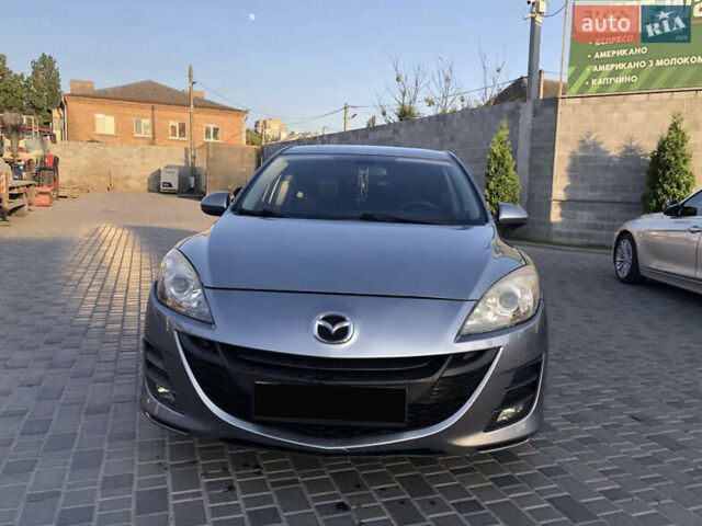 Серый Мазда 3, объемом двигателя 1.56 л и пробегом 280 тыс. км за 6000 $, фото 1 на Automoto.ua