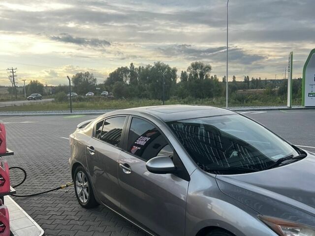 Серый Мазда 3, объемом двигателя 2 л и пробегом 224 тыс. км за 5200 $, фото 1 на Automoto.ua