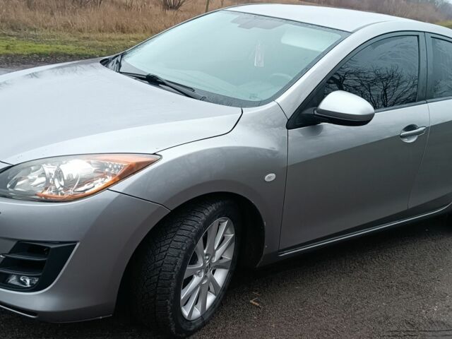 Серый Мазда 3, объемом двигателя 1.6 л и пробегом 240 тыс. км за 6500 $, фото 1 на Automoto.ua