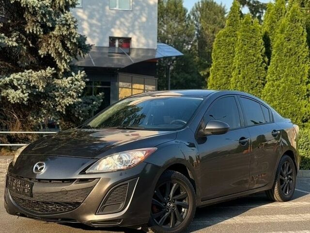 Серый Мазда 3, объемом двигателя 2 л и пробегом 235 тыс. км за 6750 $, фото 1 на Automoto.ua