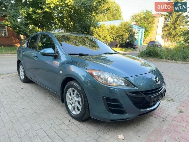 Серый Мазда 3, объемом двигателя 1.6 л и пробегом 181 тыс. км за 6499 $, фото 1 на Automoto.ua