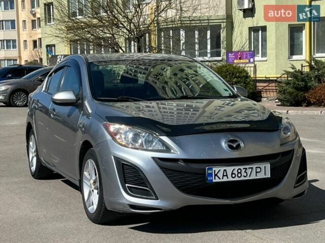Серый Мазда 3, объемом двигателя 2 л и пробегом 231 тыс. км за 6750 $, фото 1 на Automoto.ua