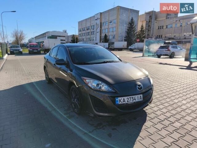 Сірий Мазда 3, об'ємом двигуна 2 л та пробігом 235 тис. км за 7016 $, фото 1 на Automoto.ua