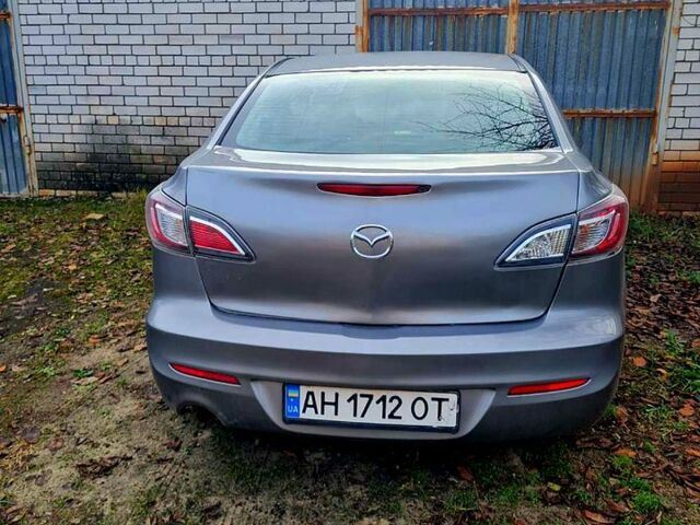 Сірий Мазда 3, об'ємом двигуна 1.6 л та пробігом 53 тис. км за 7900 $, фото 1 на Automoto.ua