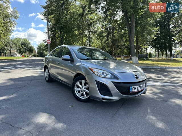 Сірий Мазда 3, об'ємом двигуна 2 л та пробігом 170 тис. км за 5799 $, фото 1 на Automoto.ua