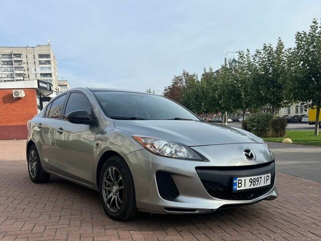 Сірий Мазда 3, об'ємом двигуна 2 л та пробігом 238 тис. км за 5999 $, фото 1 на Automoto.ua