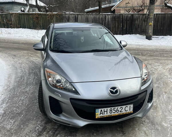 Серый Мазда 3, объемом двигателя 1.6 л и пробегом 106 тыс. км за 7500 $, фото 1 на Automoto.ua