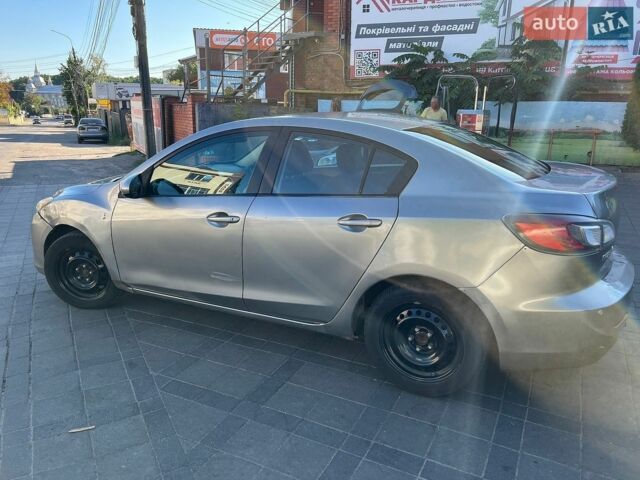 Серый Мазда 3, объемом двигателя 2 л и пробегом 226 тыс. км за 5000 $, фото 1 на Automoto.ua