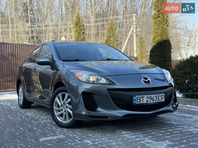 Сірий Мазда 3, об'ємом двигуна 2 л та пробігом 214 тис. км за 7250 $, фото 1 на Automoto.ua
