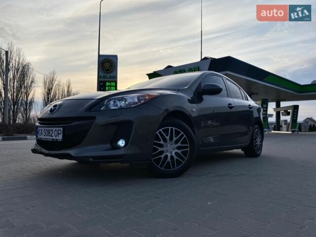 Серый Мазда 3, объемом двигателя 1.6 л и пробегом 190 тыс. км за 6999 $, фото 1 на Automoto.ua