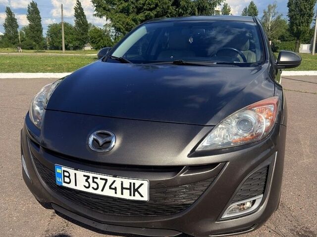 Серый Мазда 3, объемом двигателя 2.5 л и пробегом 182 тыс. км за 7700 $, фото 1 на Automoto.ua