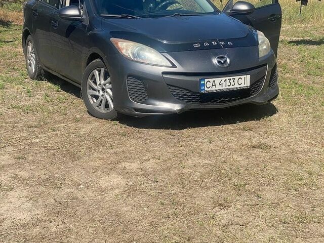 Серый Мазда 3, объемом двигателя 2 л и пробегом 250 тыс. км за 6900 $, фото 1 на Automoto.ua