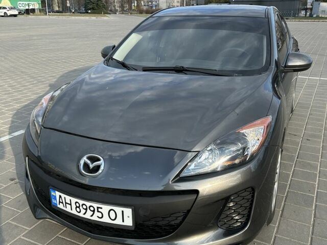 Серый Мазда 3, объемом двигателя 2 л и пробегом 225 тыс. км за 7200 $, фото 1 на Automoto.ua