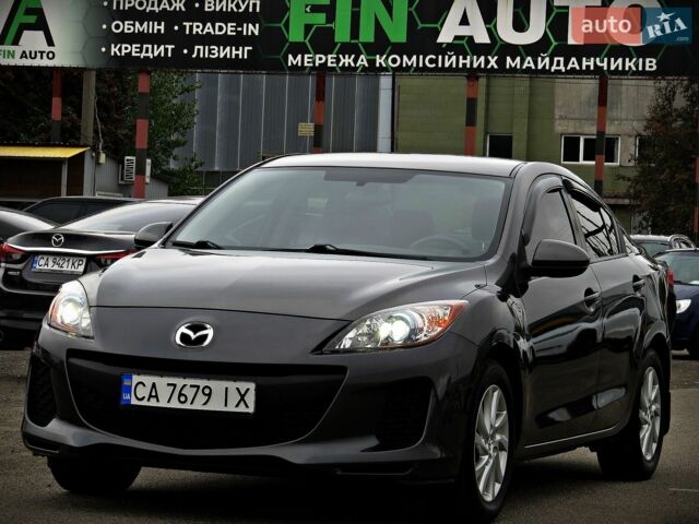 Серый Мазда 3, объемом двигателя 2 л и пробегом 198 тыс. км за 7700 $, фото 1 на Automoto.ua
