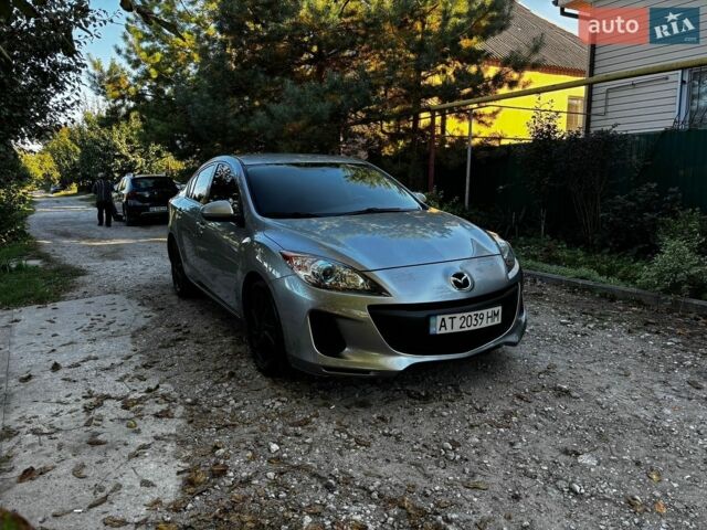 Серый Мазда 3, объемом двигателя 2 л и пробегом 185 тыс. км за 7600 $, фото 1 на Automoto.ua