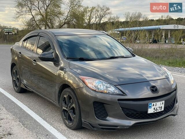 Серый Мазда 3, объемом двигателя 2 л и пробегом 297 тыс. км за 7300 $, фото 1 на Automoto.ua