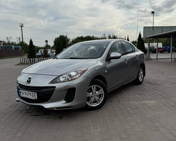 Серый Мазда 3, объемом двигателя 1.6 л и пробегом 180 тыс. км за 7900 $, фото 1 на Automoto.ua