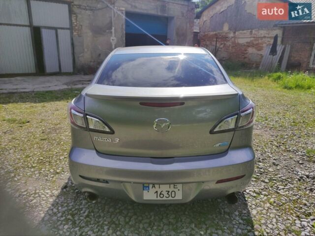Сірий Мазда 3, об'ємом двигуна 2 л та пробігом 196 тис. км за 7800 $, фото 1 на Automoto.ua