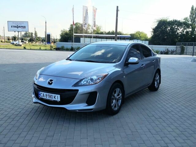 Серый Мазда 3, объемом двигателя 1.6 л и пробегом 162 тыс. км за 6999 $, фото 1 на Automoto.ua