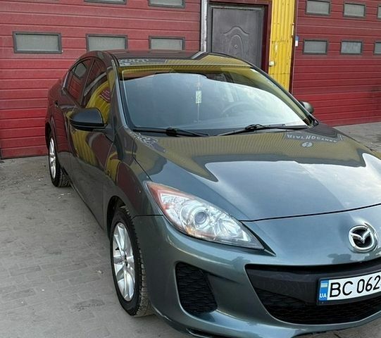 Серый Мазда 3, объемом двигателя 2 л и пробегом 160 тыс. км за 7000 $, фото 1 на Automoto.ua