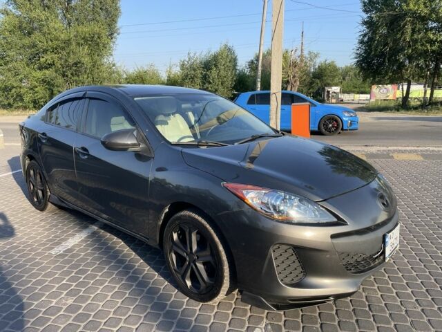 Сірий Мазда 3, об'ємом двигуна 2 л та пробігом 275 тис. км за 7298 $, фото 1 на Automoto.ua