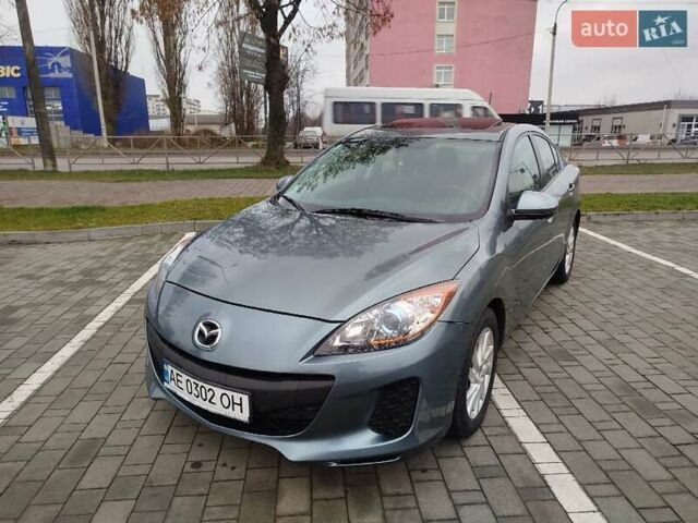 Серый Мазда 3, объемом двигателя 2 л и пробегом 232 тыс. км за 7799 $, фото 1 на Automoto.ua
