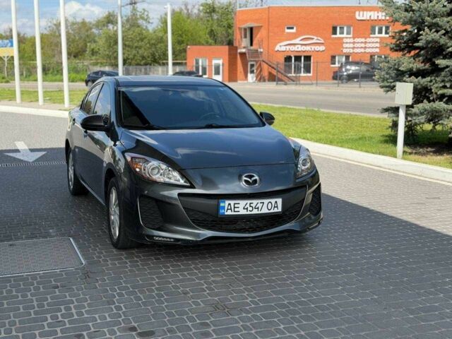Серый Мазда 3, объемом двигателя 2 л и пробегом 200 тыс. км за 7500 $, фото 1 на Automoto.ua