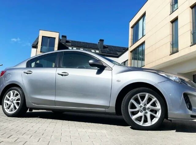 Серый Мазда 3, объемом двигателя 2 л и пробегом 113 тыс. км за 6900 $, фото 1 на Automoto.ua