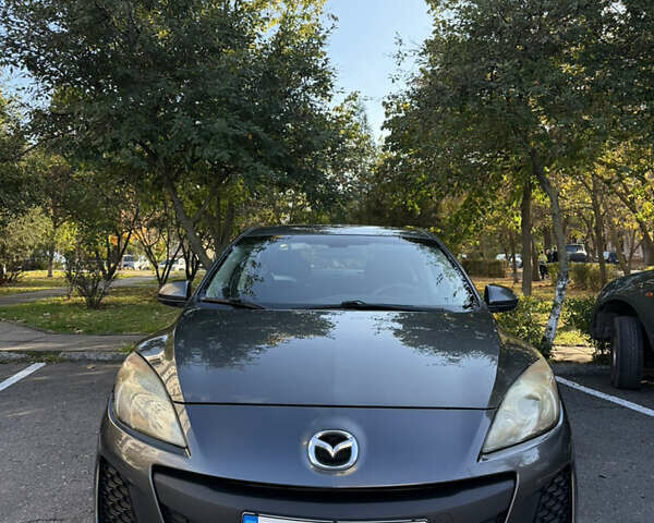 Серый Мазда 3, объемом двигателя 2 л и пробегом 201 тыс. км за 7000 $, фото 1 на Automoto.ua