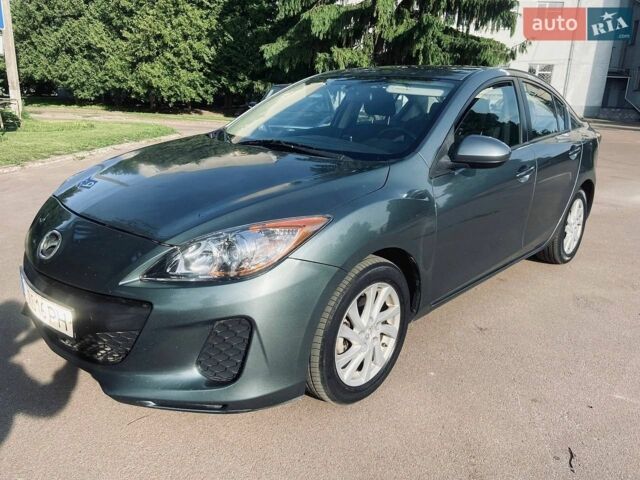 Сірий Мазда 3, об'ємом двигуна 2 л та пробігом 211 тис. км за 6300 $, фото 1 на Automoto.ua