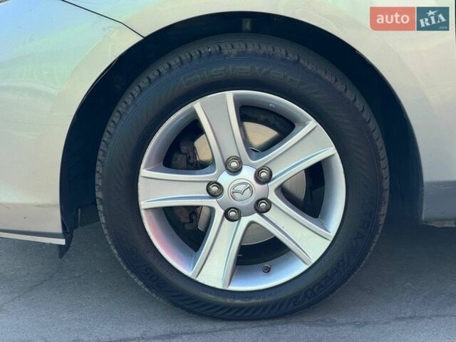 Сірий Мазда 3, об'ємом двигуна 2 л та пробігом 216 тис. км за 7800 $, фото 1 на Automoto.ua