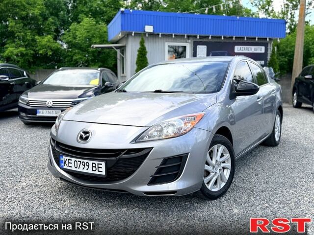 Серый Мазда 3, объемом двигателя 2 л и пробегом 132 тыс. км за 7800 $, фото 1 на Automoto.ua
