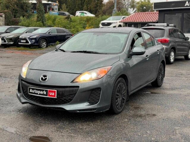 Серый Мазда 3, объемом двигателя 2 л и пробегом 245 тыс. км за 6990 $, фото 1 на Automoto.ua